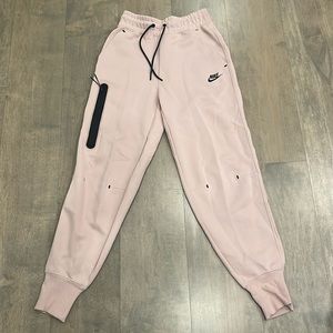 women’s Nike Tech Fleece pants.